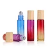 10mL Diffuseurs d'huiles essentielles Bouteille Bouteilles à rouleaux en verre Rouleau avec capuchon en plastique à grain de bois et couleur de dégradé de boule en acier inoxydable HH21-331