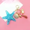 Nouveau dessin animé fantasque Sea World Pearl Shell Starfisf Keychain pentagram cristal chaîne dames sacs Car clé en alliage allié bijoux y8614058