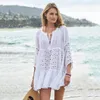 Chemisiers pour femmes Chemises pour femmes Europe et États-Unis Coton flammé Coutures en dentelle Jupe de plage à manches longues Vêtements de protection solaire