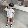 2021 Été Enfants Designer Shorts Bébé Star Stripe Splice Beach Five-Cent Pantalon Mode Enfants Camo Cartoon Pantalon court S1278