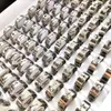 Bulk lots 100pcs lot Top Mixed Laser Cut Stainless Steel Silver Ring Men Women Fashion Cool Finger Ring Party Jewelry299G