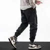 Mode Streetwear hommes jean coupe ample épissé coton Denim Cargo pantalon Vintage Designer Hip Hop Joggers jambe large Baggy pantalon