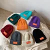 Baskar tjock stickad hatt kvinnors ull 2021 vinter damer utomhus värme mjukt öronskydd melon läder mössa