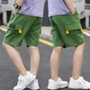 韓国の赤ちゃんの固体貨物ズボンの夏のショートパンツ緩い子供たちのショートパンツズボン服十代の12年210622
