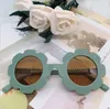 2021 Lunettes de soleil pour enfants Forme de fleur Cadre rond Lunettes de soleil abrazine Motifs colorés Verre de soleil résistant aux ultraviolets Mode photo de rue avec des lunettes WMQ993