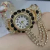 Ladies Diamond-Studded vio el reloj de pulsera de cuarzo de cuarzo Moda de la pulsera de la aleación de la moda 4 Colros para elegir