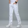 SHAN BAO Herrenmode Weiße Jeans Frühling Sommer Markenkleidung Baumwolle Elastisch Bequem Business Casual Jugend Slim 210723