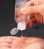 Bouteille rechargeable d'alcool vide de 50 ML/60 ML avec crochet porte-clés bouteilles de désinfectant pour les mains en plastique Transparent transparent pour le voyage à la maison