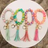 Handgemaakte uitgerekte lente regenboog siliconen kralen armband sleutelhangers PU lederen tassel polsband armband sleutelhangers voor 2022