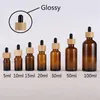 1 ounce Amber glazen druppelaar flessen voor essentiële olie met bamboe cap 15ml 20ml 30ml 50ml 100ml