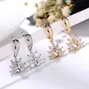 Pendientes de tuerca para mujer, joyería de moda de cristal, circonita femenina de 18 quilates, pequeño cisne chapado en oro y plata