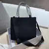 Женщины, хозяйственные сумки Мода TO2 Дизайнер Cross Body Bag Bag Lady Сумки Кошельки Треугольник Высокое Качество Большая Емкость 26 * 23см