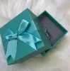 Brincos de designer de moda para jóias femininas com brutos de estilo de letra de cristal de cristal brilhante com caixa de presente de arco azul Blue Box7279741
