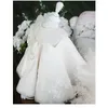 Lente tiener meisjes jurk mouwloze rug boog witte prinses jurken piano prestaties bloemen meisje voor bruiloften E01 210610