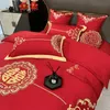 Edredones Conjuntos de ropa de cama Conjunto de cuatro piezas de boda china moderna Funda de edredón bordada de seda de algodón rojo Sábana Fundas de almohada