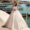 2021 A Line Abiti da sposa Abiti da sposa Taglie forti Senza maniche Corpetto trasparente Bottone ricoperto Applique in pizzo Perline Vestios De Novia