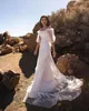 Stylish Beach Wedding Dresses Sheer Off The Shoulder Neck Bridal Gowns Half Sleeves A Line Sweep Train Tulle Bohemian robe de mariée