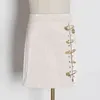 Faldas asimétricas con alfileres de retazos para mujer, minifalda informal de cuero PU de cintura alta, ropa de moda femenina 210521