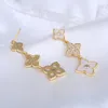 Coreano moda trevo de quatro folhas zircon brincos de longa borla temperamento senhoras auricular agulling jóias dangle candelabro