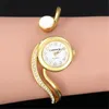 Wristwatches Watch For Women 2021 Ladies 18K Gold Gemstone Unique Design Quartz Watches Cuff Bangle Clock Zegarek Damski4870603