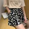 Femmes Vintage imprimé fleuri Sexy Harajuku lâche goutte Kawaii à volants plissé été coréen Streetwear taille élastique Shorts 210527