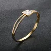 Brazaletes de cristal de la cruz hueca de lujo para las mujeres hombres de alta calidad moda de acero inoxidable pulseras de oro regalos de joyería Q0717