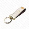 Designer Keychains Car Key Chain Bags Decoration Cowhide Gift Design för Man Woman 4 Alternativ Toppkvalitet2836