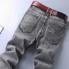 Mäns Stretch Regular Fit Jeans Business Casual Classic Style Fashion Denim Trousers Male Black Blue Grey Pants 220115