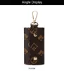 Män och kvinnor Luxury Leather Key Clip Bag Fashion Printing Multifunktionell plånbok Keychain Holder Case Cover Pures Pouch Mini Pen307R