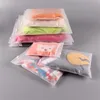 100 stks / partij Frosted Ritssluiting Seal Plastic Bag Draagbare Reizen Opbergzakken Reclosable Packaging Pouch voor Gift Kleding Sieraden Voedsel