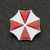 Broche Biohazard Alice Umbrella Corporation, Badge amulette en émail rouge et blanc, bijoux de jeu de film pour hommes et femmes