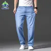 Homens lyocell tecido jeans clássico outono algodão reto trecho marca calças jeans macacões luz azul ajuste calças 40 42 44 211108