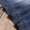 Italiano estilo moda homens jeans de alta qualidade algodão elástico magro encaixe rasgado para desenhista vintage calças denim hombre vk70