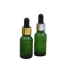 Garrafa de óleo essencial verde Matéria Borracha preta Borracha de ouro brilhante Anel de prata vazio Embalagem de embalagem de embalagem de embalagem de vidro vials 5ml 10ml15ml 20ml 30ml 50ml 100ml