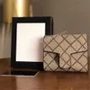 Berömd väskedesigner Lady Fashion Handväskor Letter Metal CLAP Wallet Plain Perforated Artwork Luxury With Pack Box Dust Purse Clutch Bags Handväska