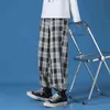 Men Polyester Loose Japan Harajuku style Grid Wide Pants Men Casual Drawstring Elastic Leg opening Ankle Length Pants Men 211112