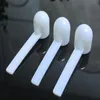 Moda professionale in plastica bianca 5 grammi 5G cucchiai cucchiai per cibo latte detersivo in polvere medicina misura 8,5 * 2,6 cm