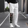 男性印刷貨物パンツファッショントレンドカジュアルヒップホップ巾着緩いスポーツズボンデザイナー秋高品質男性ストレートスウェットパンツ