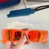 Okulary przeciwsłoneczne dla Męskie Kobiet Moda Klasyczna Płyta Kwadratowa Czarna Pomarańczowa Rama Plaża Wakacje Designer Glasses 0516S Anti-Ultrafiolet Obiektyw z oryginalnym pudełkiem