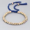 Braccialetti con ciondoli Buddista tibetano regolabile Filo di cotone intrecciato a mano Perline di rame Bracciale con nodi fortunati Gioielli da donna in ottone