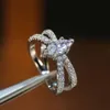 Anneaux de mariage mode X forme croix anneau femme Micro pavé CZ cristal couleur argent incrusté oeil de cheval pour les femmes cadeau