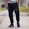 Herrbyxor streetwear män multi-pocket last herr joggare bomull militärbyxor hip hop elasticitet svettbyxor mans storlek 28-40