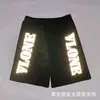 Versie correct van casual hoge straat losse shorts reflecterende letter print broek