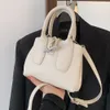Små vita läder axelväskor för kvinnor ren färg Digner Crossbody Ladys Drawstring Tote Msenger Bag Wild Handväskor