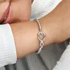 Högpolsk 100% 925 Sterling Silver Infinity Knot Bangle Fashion Bröllop Engagemangsmycken gör för kvinnor gåvor309b
