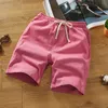 Pantalones cortos de lino para hombre tendencia verano rosa pantalones de cinco puntos color caramelo dormir hombres grandes mitad 210714
