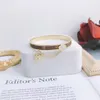 Bracelets de bijoux de créateurs bracelets en or rose argent en acier inoxydable luxe simple boucle de motif de croix love bijoux femmes hommes Bra3420821