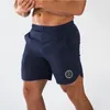 MUSCLEGUYS MENS BOARD Shorts Sexy Beach Bermuda Wear Sea Short Men Gym Shorts Quick Dry Joggers Zietbomen Fitness Shorts 210322
