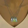 輝くネックレス女性のファッションの発光の石のネックレスグローダークペンダントネックレス