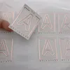 Custom Square Rose Pink Stamping Foil Logo Sticker White PVC Vinyl Adhesive Stickers Labels Sheet Package